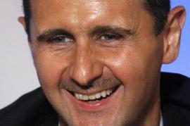Il dittatore Assad (foto di The Guardian)