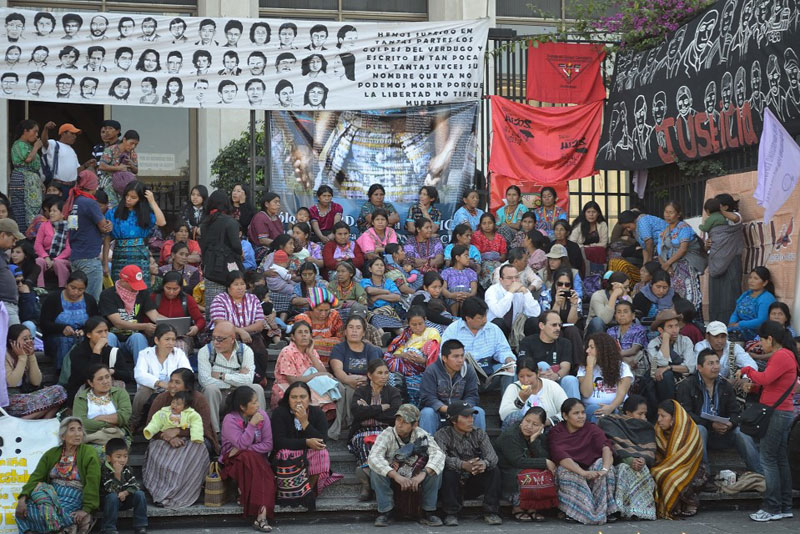 Guatemalans gathered to attend the first hearing of the trial in Rios Montt, 26 January 2012.